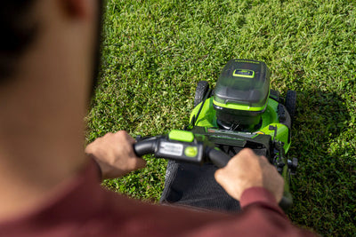 Greenworks push mower vs. self-propelled lawn mowers